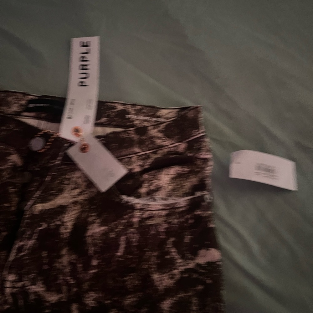 Brand new, purple jeans